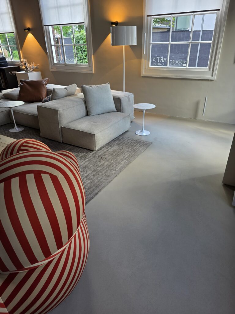 Modern living room with striped chair