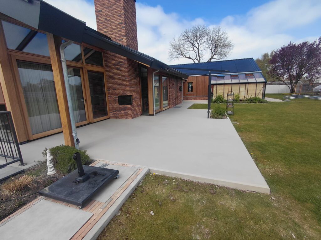 Modern house with patio and garden